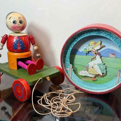 Antique wood pull toy musical bank