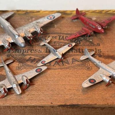 Five dinky toys model airplanes