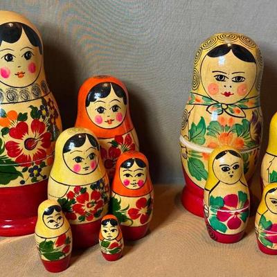 Two sets of matryoshka dolls or russian nesting dolls
