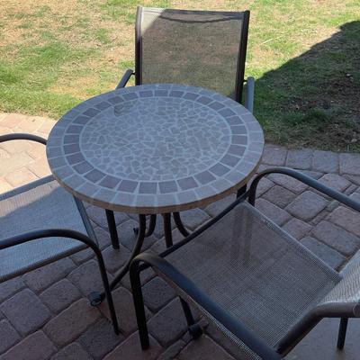 Outdoor table with three chairs