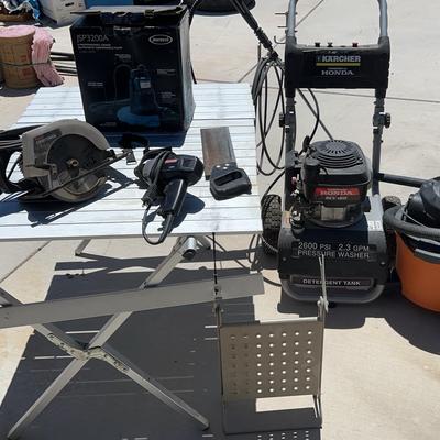 Assorted power tools, and portable workbench