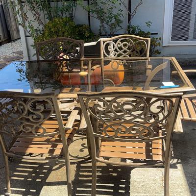 Glass Top Table 65.5x40x29 And 6 Arm Chairs 25x20.5x36