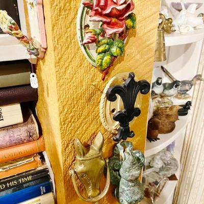 Sale Photo Thumbnail #56: large collection of antique door knockers all throughout the home