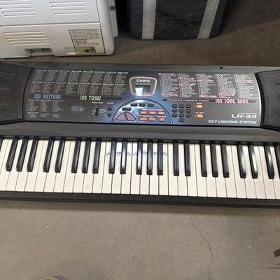 #7070 • Casio Electronic Keyboard
