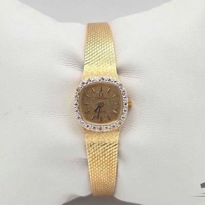 #1103 • 14k Gold Omega Watch with Diamond Accents
