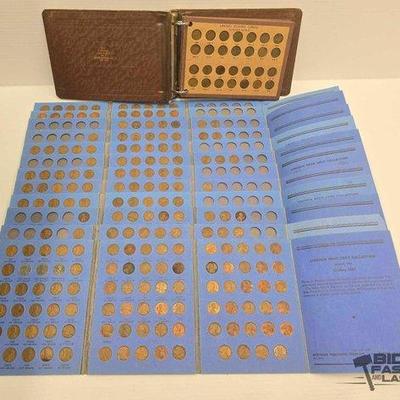 #1506 • Over 900 Pennies in Coin Albums
