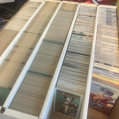 Hundreds of sports cards in bulk sets