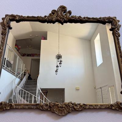 Ornate Gold-Tone Wall Mirror – Decorative Scroll and Floral Frame
