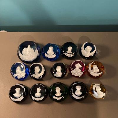 Glass Paperweights Of Various Historical Figures