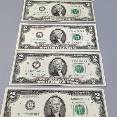 Five $2 Dollar Bills