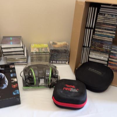 Sale Photo Thumbnail #210: CD’s And Headphones