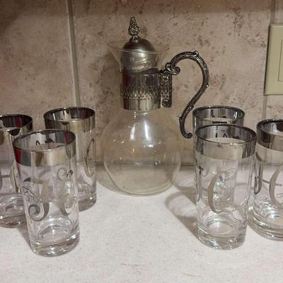 Sale Photo Thumbnail #161: Silver Colored Glassware And Carafe 