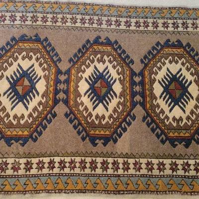 Handwoven Wool Rug – Geometric Tribal Design in Earth Tones & Blue Accents
