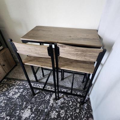 Bar height table & chairs $75

Original $113