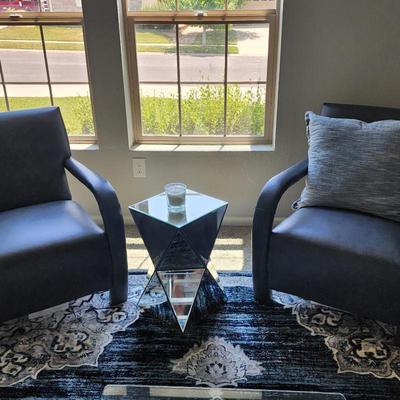 blue leather set of 2 --- $800
mirror side table ---$65