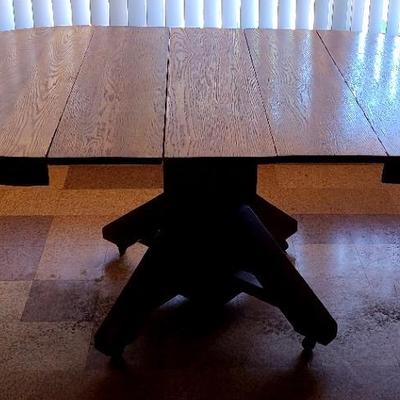 Wood On Wheels - Dramatic Dining Table With Bold Base