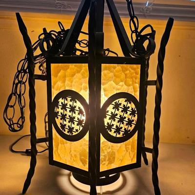 Wrought Iron Hanging Lantern with Textured Amber Glass