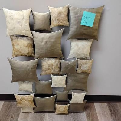 Light Colored Metal Wall Hanging