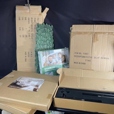 Various Household Decor And Products In Boxes