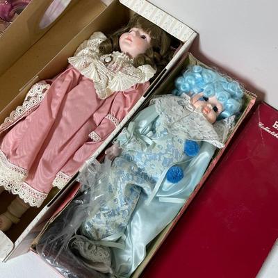 Two Porcelain Dolls In Boxes