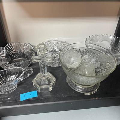 Lot of clear glass including a crucifix candle holder
