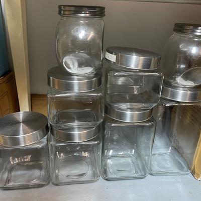 Lot Of Class Canisters With Metal Kids