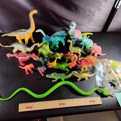Lot Of Toy Dinosaurs And Reptiles