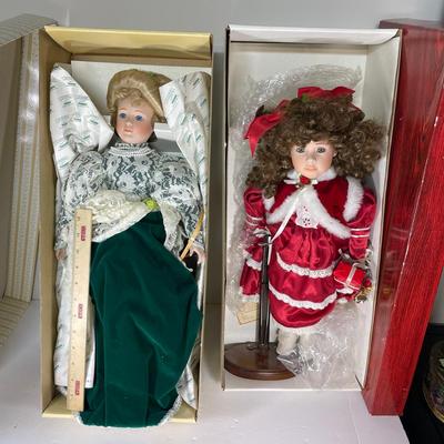 Two Large Porcelain Dolls In Boxes