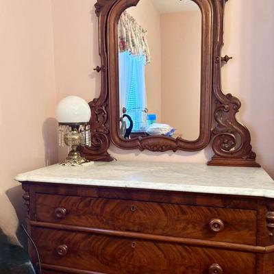 Marble top dresser with mirror