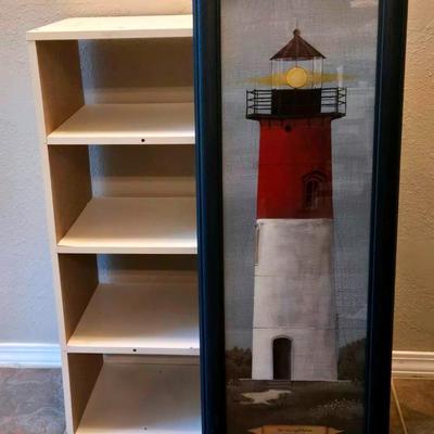A Cubicle Shelf and a Lighthouse Art Piece