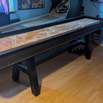 Sale Photo Thumbnail #5: $200 9' shuffleboard table, pucks, brush, bowling pin game add-on