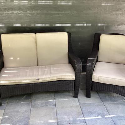 Outdoor wicker furniture chair and loveseat