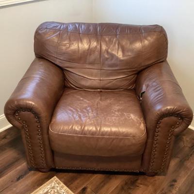 Sale Photo Thumbnail #85: Overstuffed brown leather arm chair