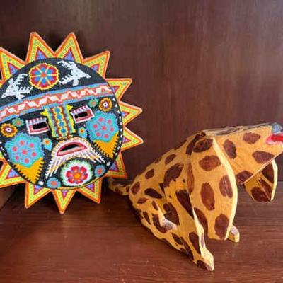 Tribal seed bead sun mask and carved folk art dog