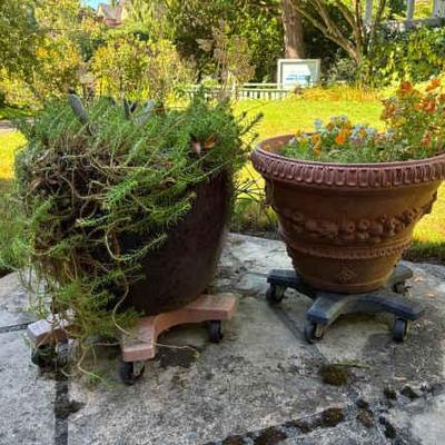 Large ceramic plant pot and pair of decorative plastic pots