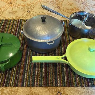 Dansk green pot all clad and chilewich rug