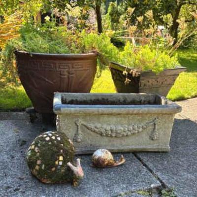Plant pots and snail yard art