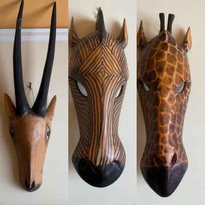 Trio of carved animal tribal mask