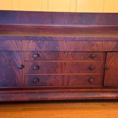 Antique flame mahogany side board