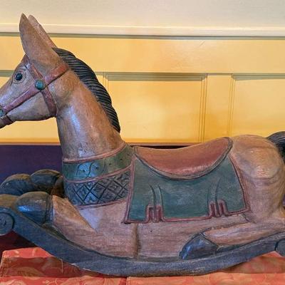 Carved wood rocking horse
