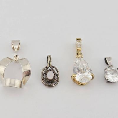 Four Sterling Silver Pendants