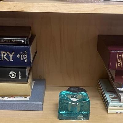 Dictionary’s And Random Books And Glass Candle