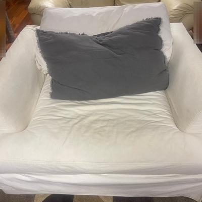 Large White Chair With Grey Pillow And Cover Is Washable 