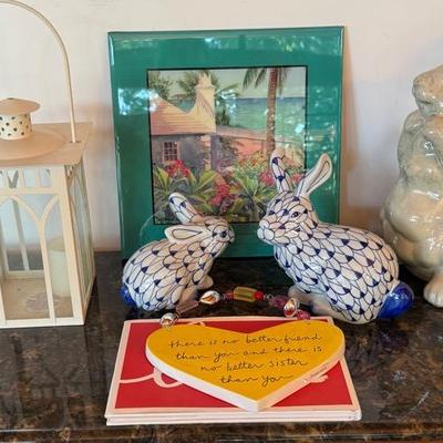 Decorative Bunnies, The image shows a framed lithograph titled "Bermuda Cottage" by artist R.E. Kenn