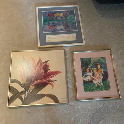 The image shows a framed print of a pink lily by artist Gloria Eriksen. And 2 Painted Pictures