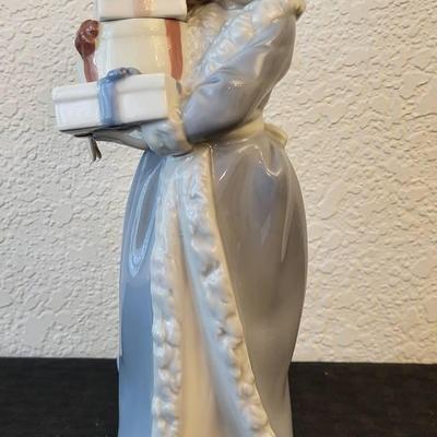 Nao by Lladro: "Christmas Girl w/ Gifts" (K)