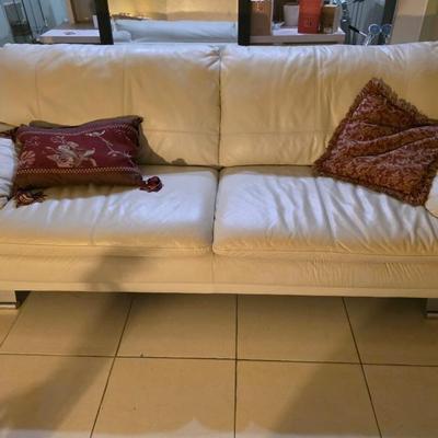 White leather sofa and matching side chair 