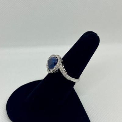 Sale Photo Thumbnail #210: Designer: Bruno Crivelli, Blue heart Sri Lanka sapphire (graded & certified with HKD report, included) with a halo of 94 diamonds 0.64cts, "G-H" color, "VS" clarity. Appraisals included. $12,500.00