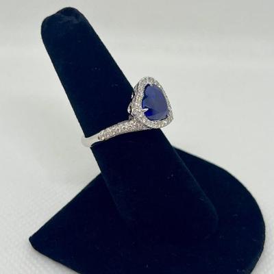 Sale Photo Thumbnail #209: Designer: Bruno Crivelli, Blue heart Sri Lanka sapphire (graded & certified with HKD report, included) with a halo of 94 diamonds 0.64cts, "G-H" color, "VS" clarity. Appraisals included. $12,500.00