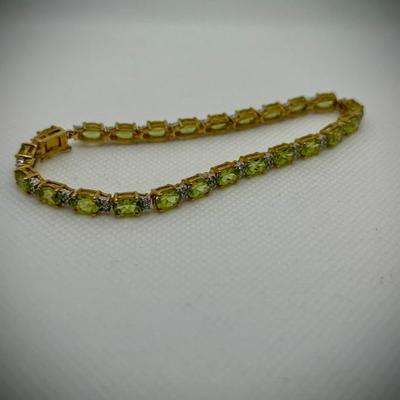 Sale Photo Thumbnail #33: Peridot bracelet in 18K $585.00
